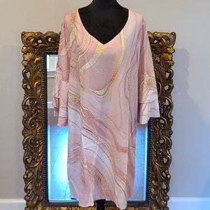 Fashion says 'me too' style says 'only me' 
Pink Dress size XXL